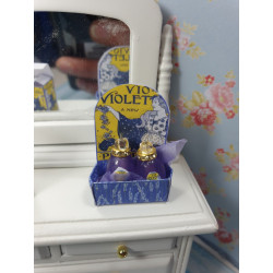1:12 doll house. Exhibitor with two perfumes. VIOLET