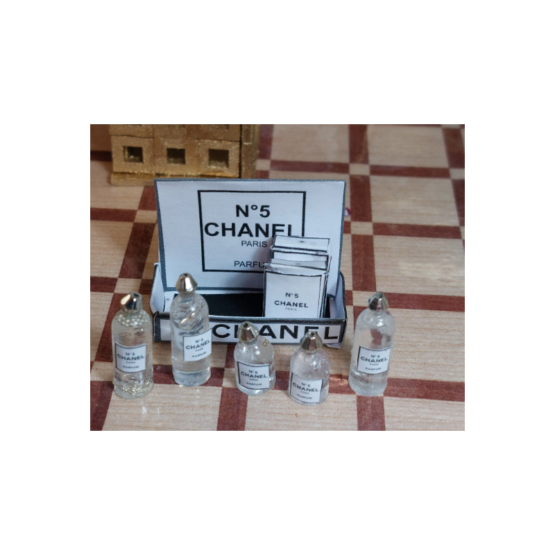 1:12 doll house. Exhibitor with perfume bottles and boxes. chanel